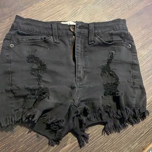 Black ripped shorts